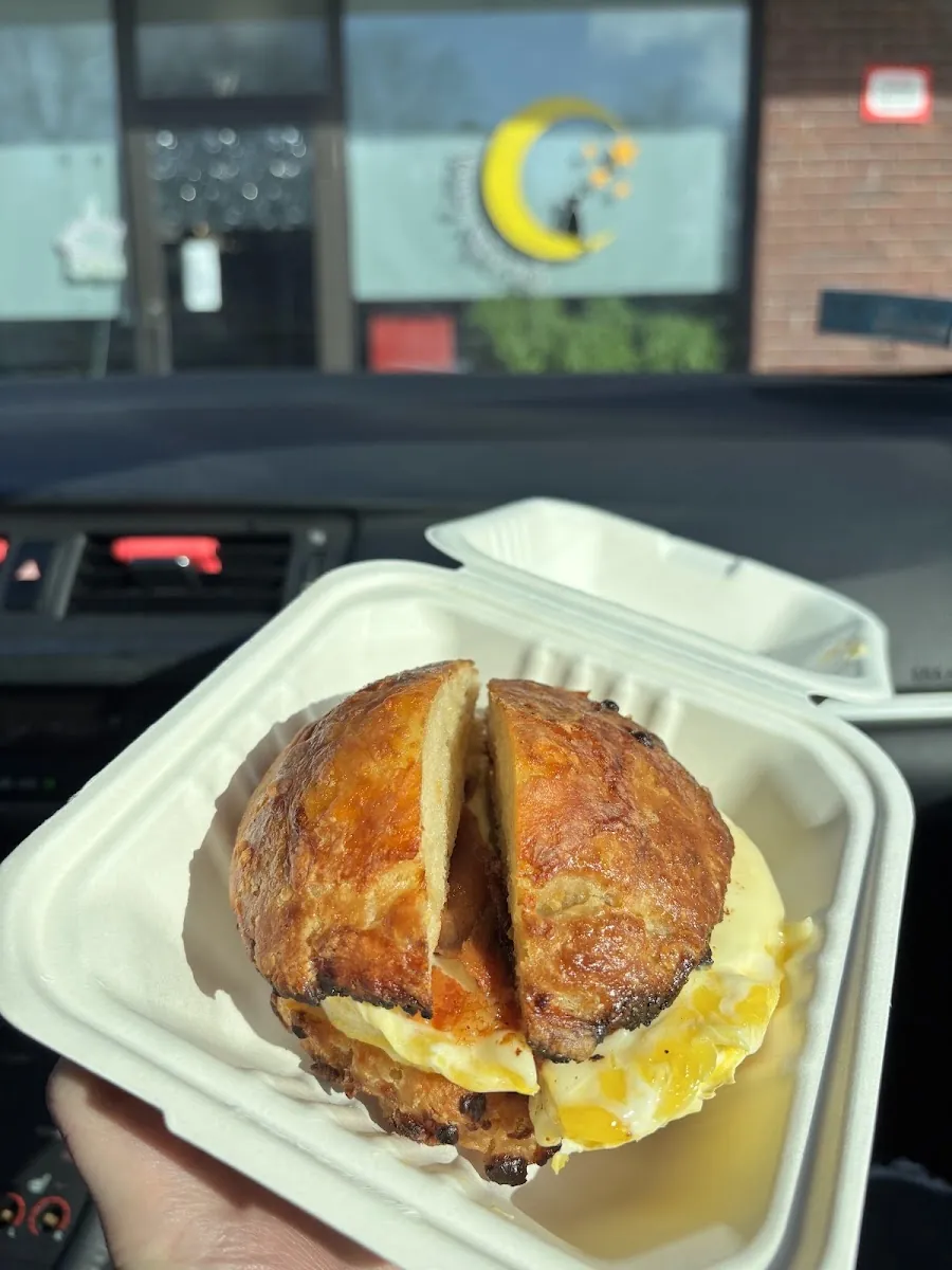 A cheddar-biscuit breakfast sandwich with a runny egg from Starry Night Cafe